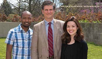 Denvil Duncan, Michael Rushton, and Ashly Aiko Nelson stand in the sunshine in the former SPEA plaza.