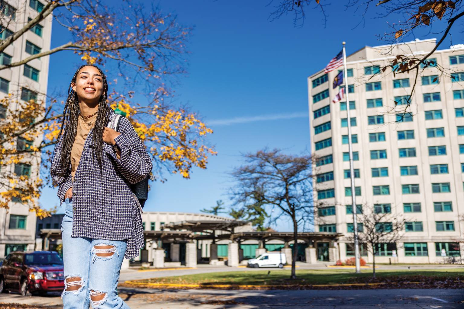 Student walks past Briscoe 